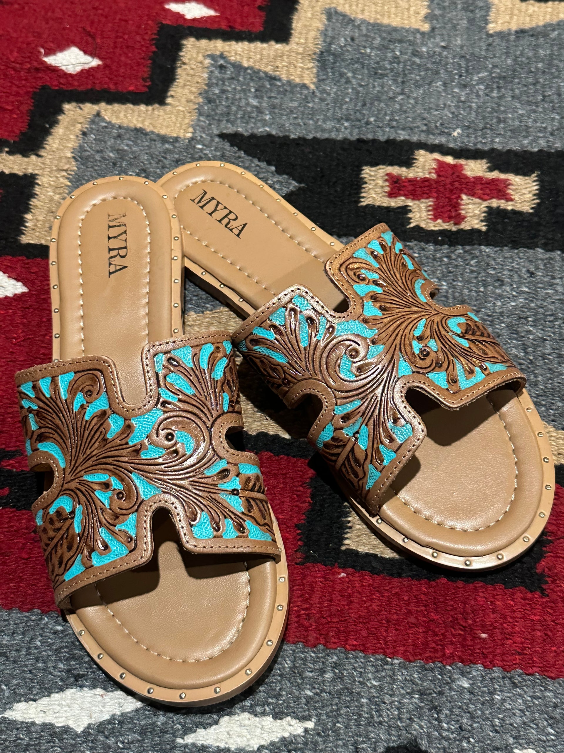 The Myra Turquoise Slides