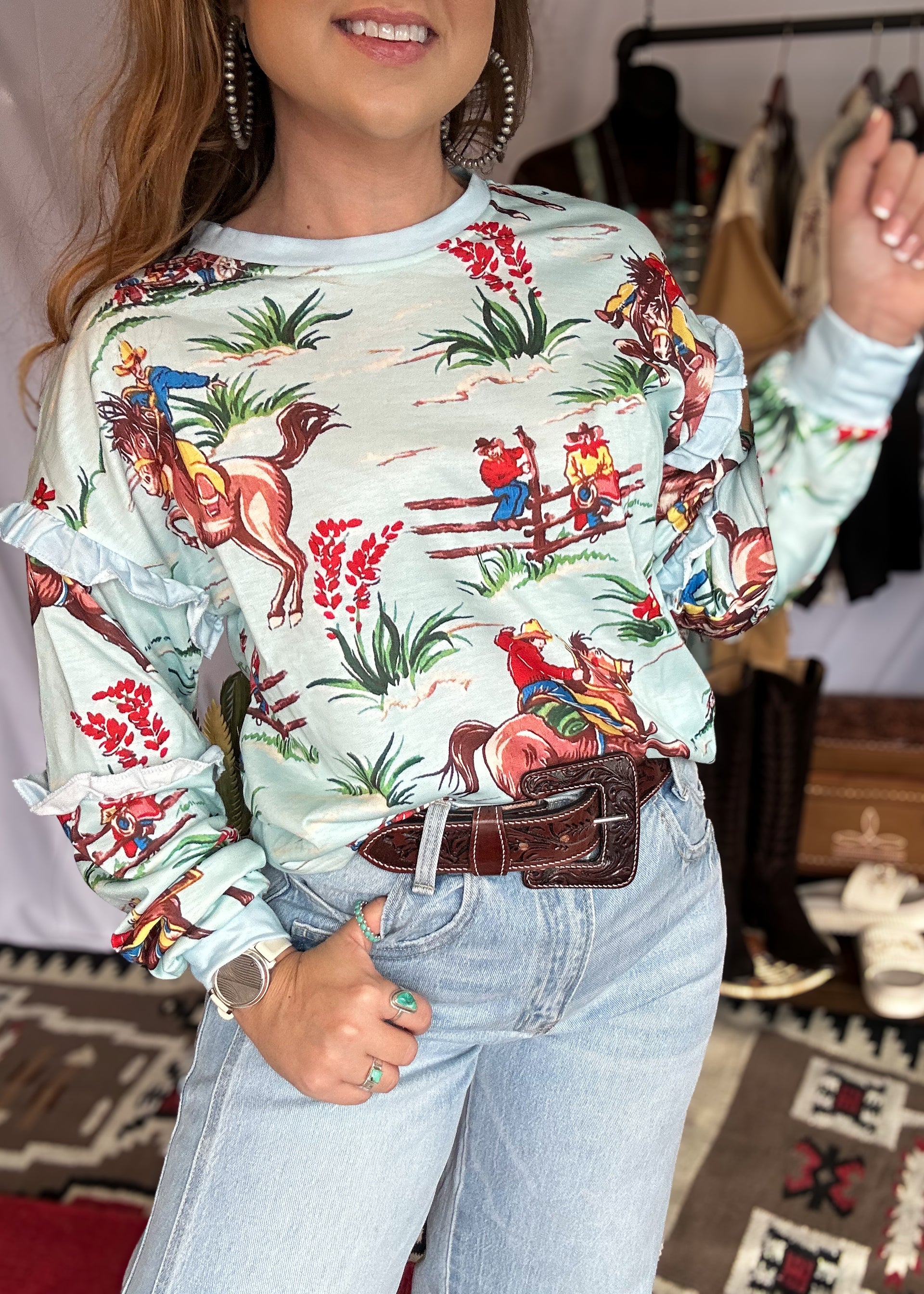 The Buckin’ Beauty Ruffle Pullover